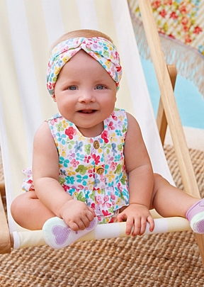 Item: printed short jumpsuit with Mayoral ribbon - Turquoise printed short jumpsuit with Mayoral ribbon - Turquoise